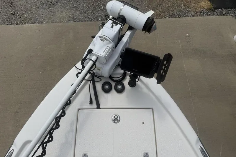 Slide: The Image of Bow of 2021 Sea Born FX21 Bay boat with trolling motor and navigation equipment. - 4