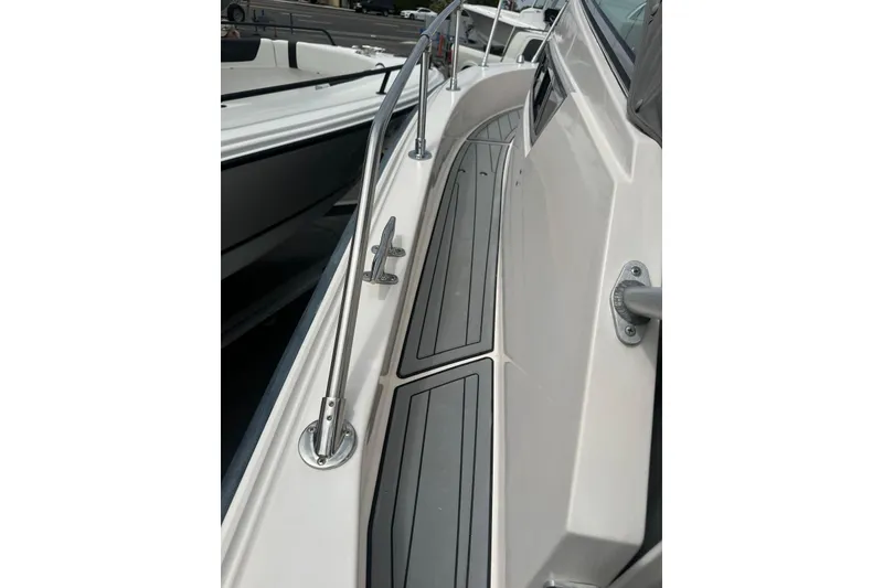 Slide: The Image of 1997 Grady-White Seafarer 228 boat deck with stainless steel railings. - 21