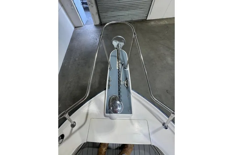 Slide: The Image of Bow view of 1997 Grady-White Seafarer 228 with anchor and railing. - 24