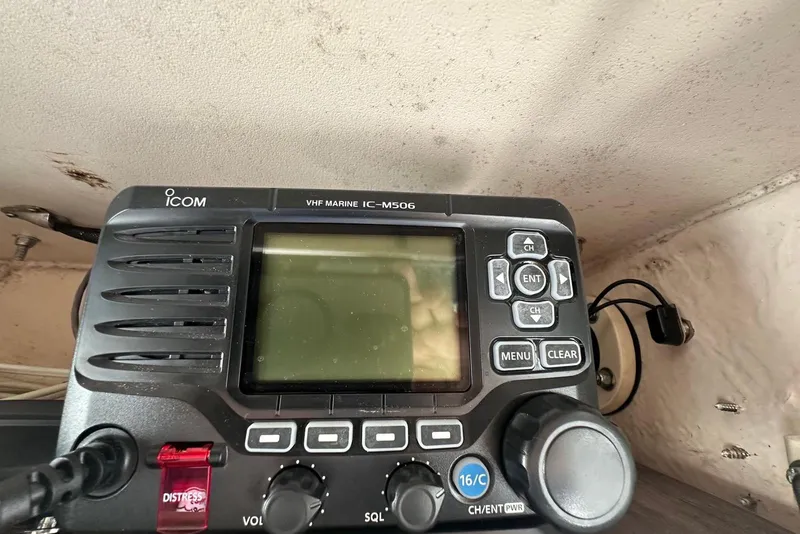 Slide: The Image of ICOM VHF Marine IC-M506 radio on 1997 Grady-White Seafarer 228 boat dashboard. - 30