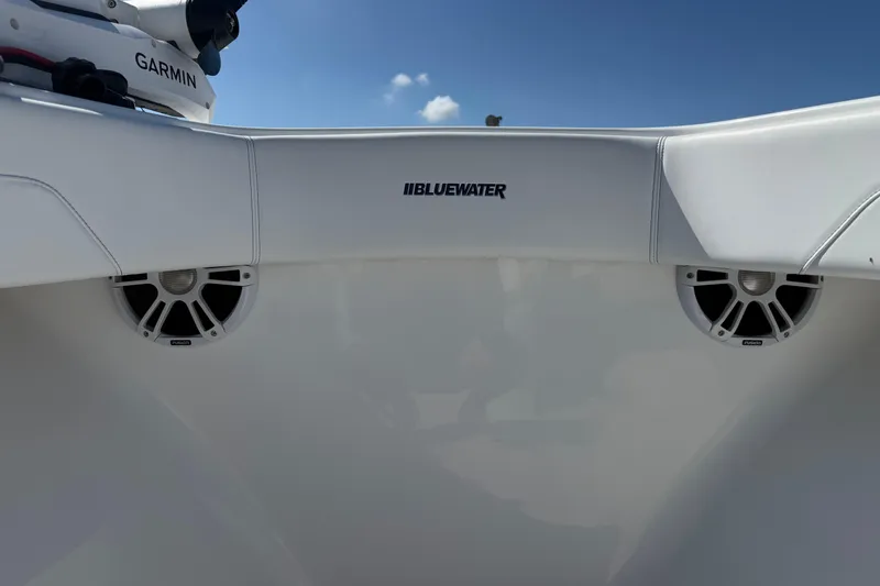 Slide: The Image of 2025 Bluewater 25t boat interior with speakers and Garmin equipment. - 21