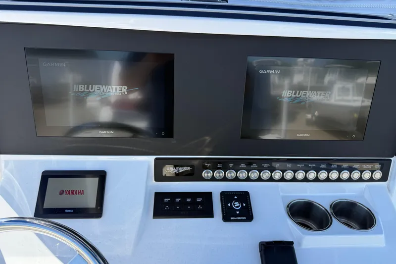 Slide: The Image of Dashboard of 2025 Bluewater 25t boat with Garmin and Yamaha displays. - 33