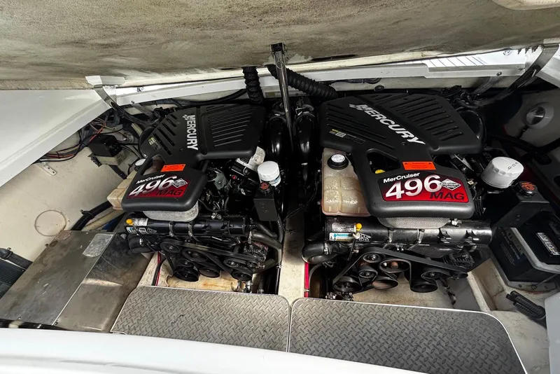 Slide: The Image of Twin MerCruiser 496 MAG engines in a 2004 Formula 330 Sun Sport boat. - 20