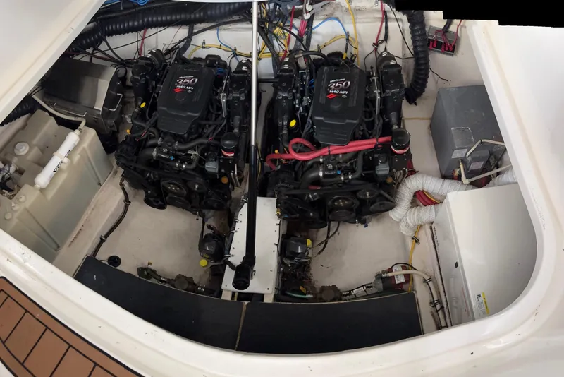 Slide: The Image of Engine compartment of a 2006 Chaparral 330 Signature boat with dual MerCruiser engines. - 13