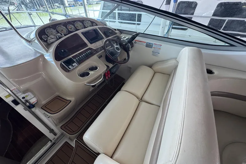 Slide: The Image of 2006 Chaparral 330 Signature boat cockpit with steering wheel and instrument panel. - 20
