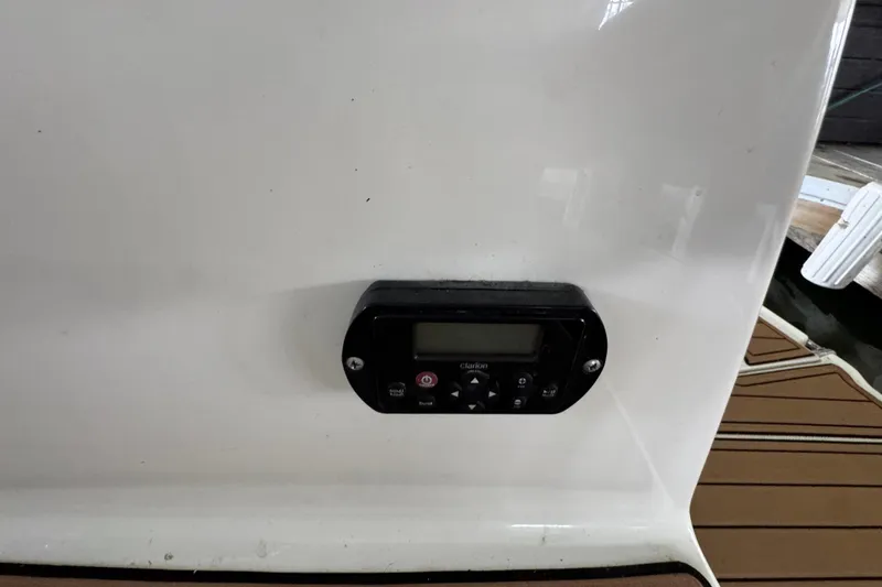 Slide: The Image of Control panel on 2006 Chaparral 330 Signature boat, mounted on white surface. - 41