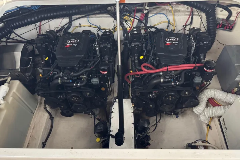 Slide: The Image of Engine compartment of a 2006 Chaparral 330 Signature with twin MerCruiser 350 MAG MPI engines. - 42