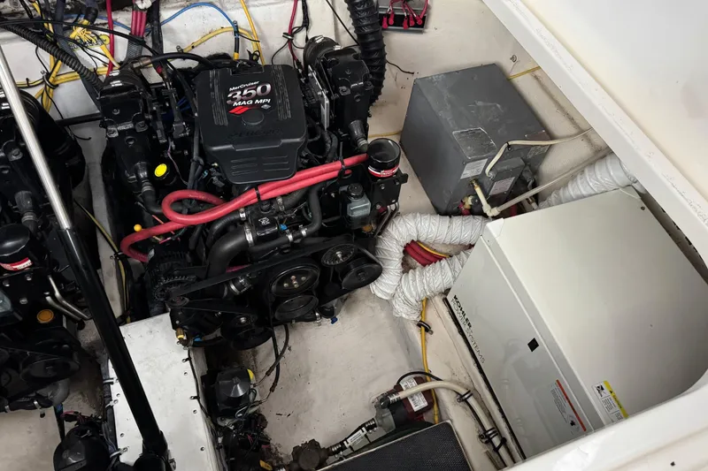 Slide: The Image of Engine compartment of a 2006 Chaparral 330 Signature boat with MerCruiser 350 MAG MPI engine. - 43
