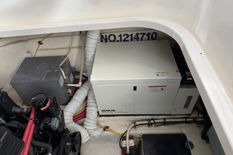 Slide: The Image of Engine compartment of 2006 Chaparral 330 Signature with Kohler power system. - 44