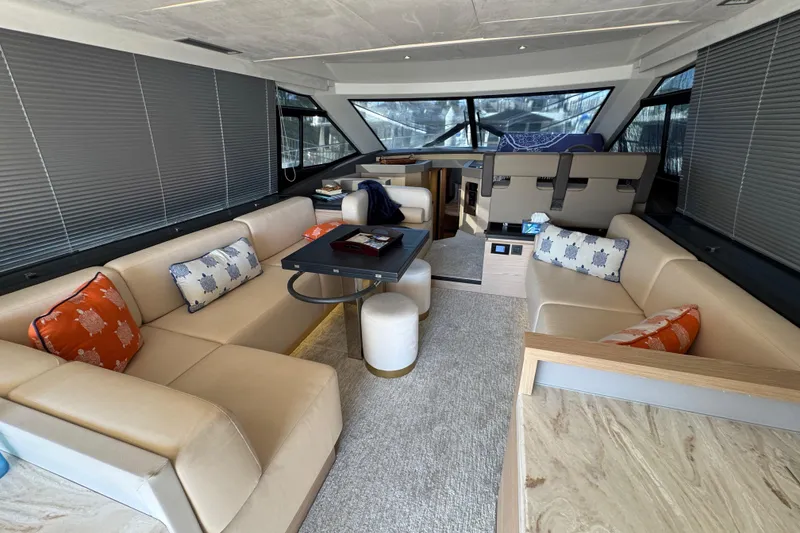 Slide: The Image of Luxurious interior of 2020 Beneteau Monte Carlo 52 yacht with elegant seating and decor. - 17