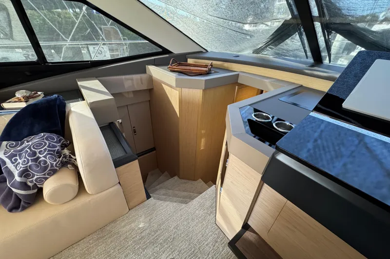 Slide: The Image of Luxurious interior of 2020 Beneteau Monte Carlo 52 yacht with modern design elements. - 24