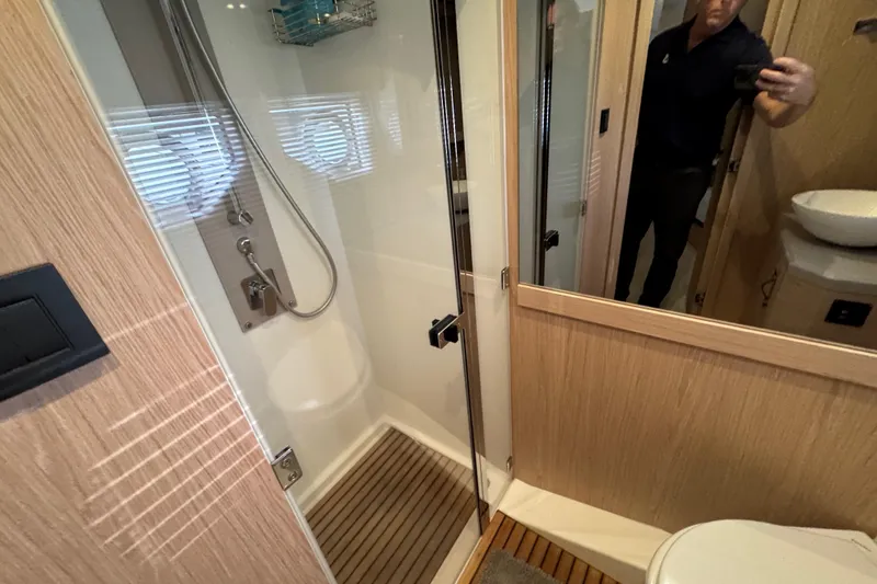 Slide: The Image of Luxurious bathroom in 2020 Beneteau Monte Carlo 52 yacht with modern shower. - 31