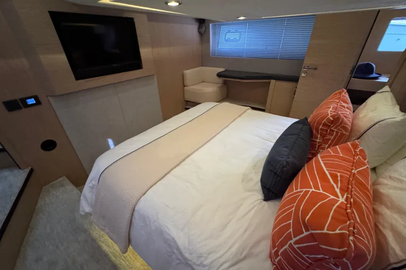 Slide: The Image of Luxurious bedroom interior of 2020 Beneteau Monte Carlo 52 yacht with modern decor. - 33