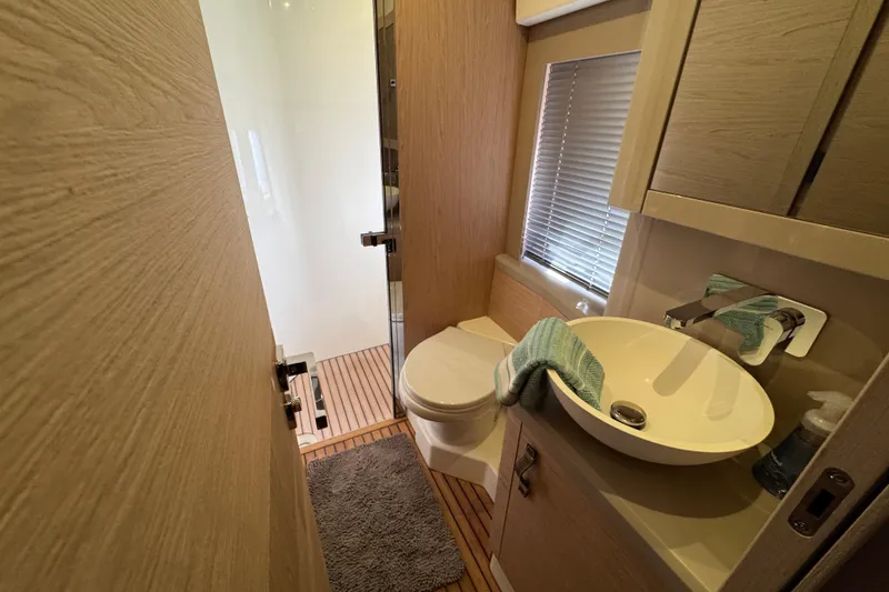 Slide: The Image of Luxurious bathroom in 2020 Beneteau Monte Carlo 52 yacht with modern fixtures. - 35