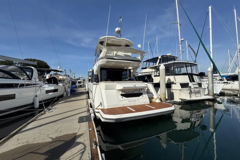 Slide: The Image of 2020 Beneteau Monte Carlo 52 yacht docked at marina, San Diego, clear sky. - 4