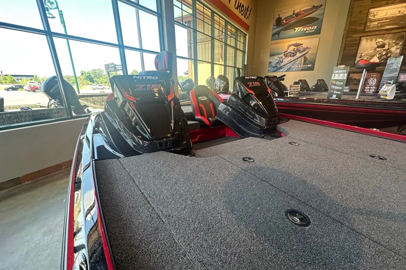 Slide: The Image of 2025 Nitro Z18 Pro boat displayed in showroom with sleek design and modern features. - 8