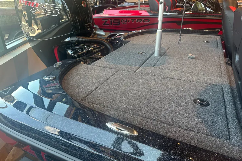 Slide: The Image of 2025 Nitro Z18 Pro boat with Pro XS engine, featuring spacious carpeted deck. - 12