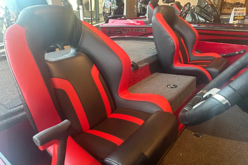Slide: The Image of 2025 Nitro Z18 Pro boat seats, black and red design, interior view. - 9