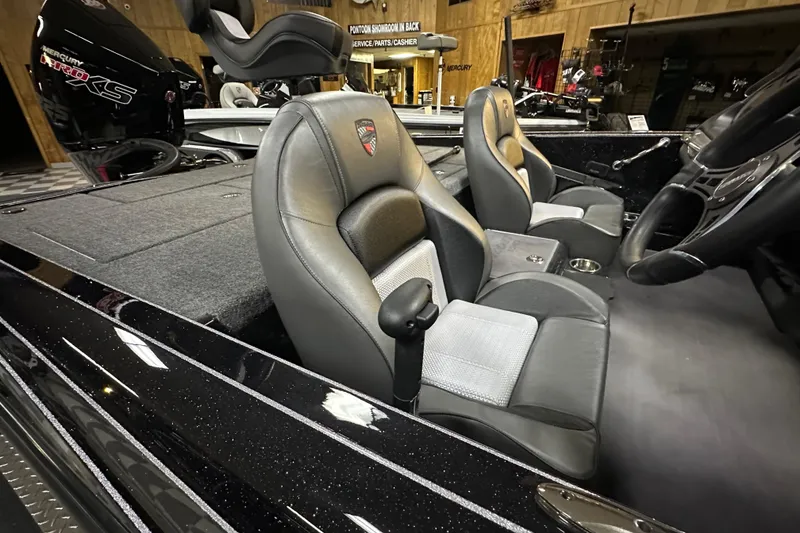Slide: The Image of 2025 Triton 19 TrX Patriot boat interior with sleek seating and modern design. - 73