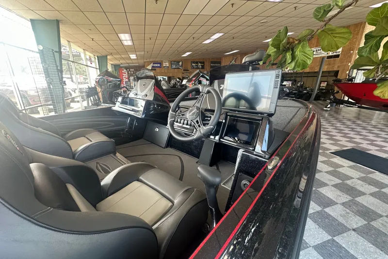 Slide: The Image of Interior of 2026 Triton 20XP Patriot boat with modern dashboard and seating. - 138
