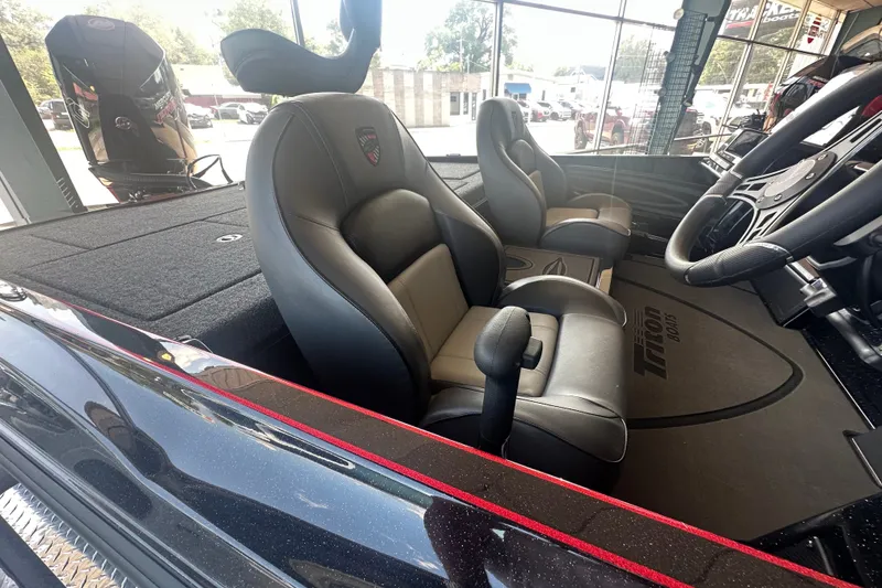 Slide: The Image of Interior of 2026 Triton 20XP Patriot boat with sleek seating and modern controls. - 137