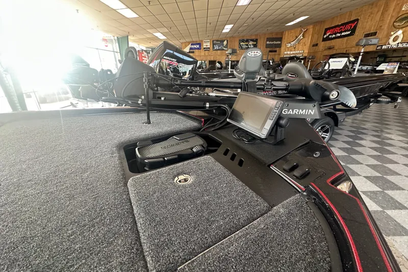 Slide: The Image of 2026 Triton 20XP Patriot boat interior with Garmin navigation system in showroom. - 135