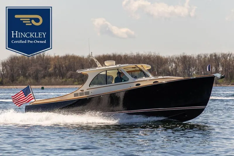 The Image of 2014 Hinckley Talaria 34 boat on water, certified pre-owned. - 0