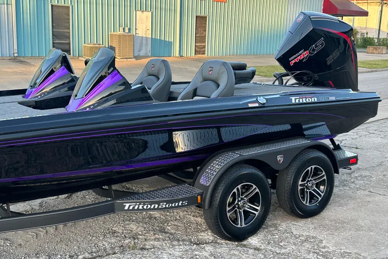 The Image of 2026 Triton 20XP Patriot boat with dual consoles and Mercury Pro XS engine. - 0