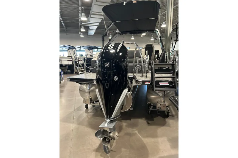 Slide: The Image of Barletta Corsa 23UA 2026 pontoon boat in showroom. - 10