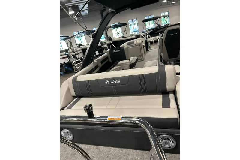 Slide: The Image of Interior view of the 2026 Barletta Corsa 23UA pontoon boat. - 7