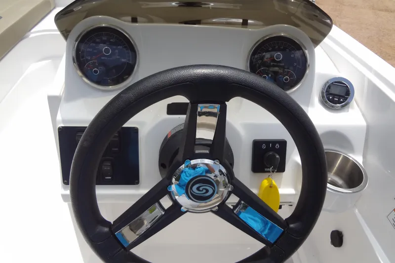 Slide: The Image of Steering wheel and dashboard of 2022 Hurricane SunDeck Sport 185 OB boat. - 16