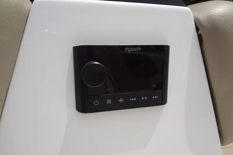 Slide: The Image of Fusion audio system on 2022 Hurricane SunDeck Sport 185 OB boat dashboard. - 19