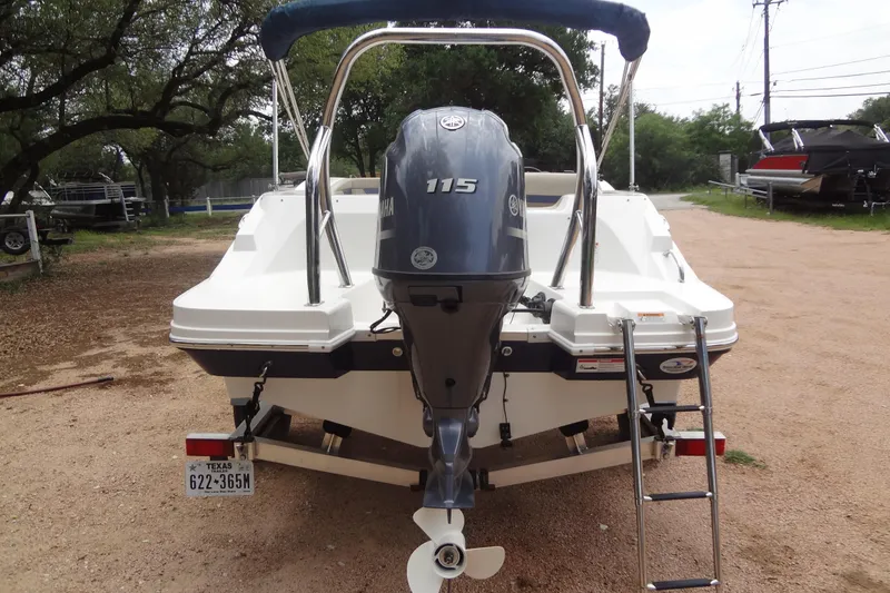 Slide: The Image of 2022 Hurricane SunDeck Sport 185 OB boat with Yamaha 115 engine, rear view. - 3