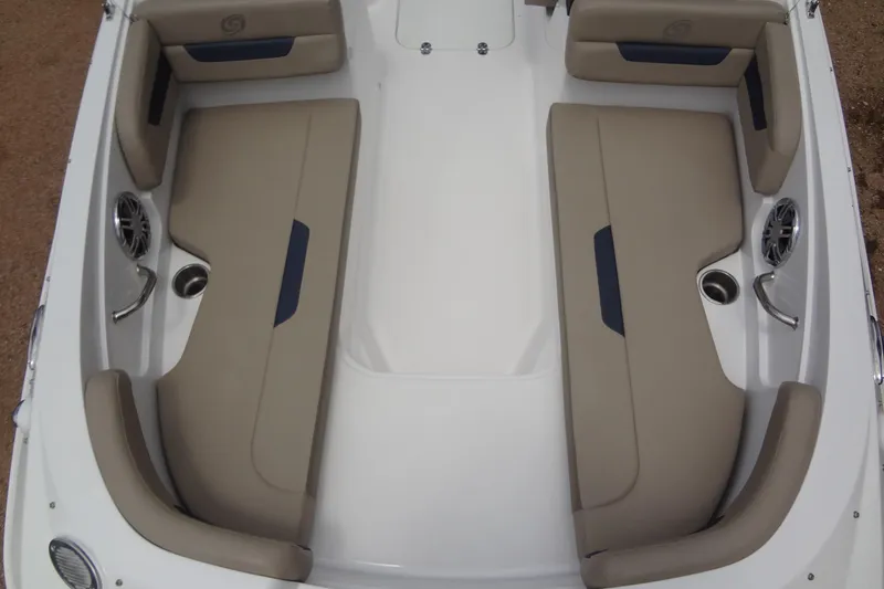 Slide: The Image of 2022 Hurricane SunDeck Sport 185 OB boat interior with beige seating and cup holders. - 8