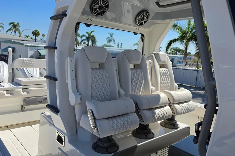 Slide: The Image of Luxurious seating on 2026 Solace 35CS boat, featuring plush, diamond-stitched upholstery. - 12
