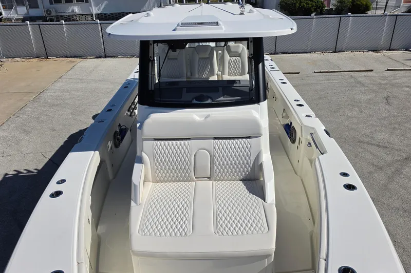 Slide: The Image of 2026 Solace 35CS boat with white quilted seating and sleek design. - 15