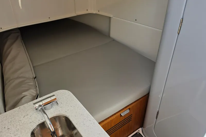 Slide: The Image of Interior cabin of 2026 Solace 35CS boat with bed and sink. - 20
