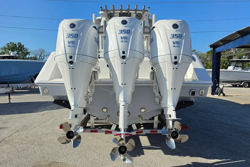 Slide: The Image of Triple Yamaha 350 V6 outboard engines on a 2026 Solace 35CS boat. - 5