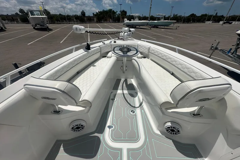 Slide: The Image of 2022 Glasstream 280 Pro-XS boat interior with white seating and modern design. - 10