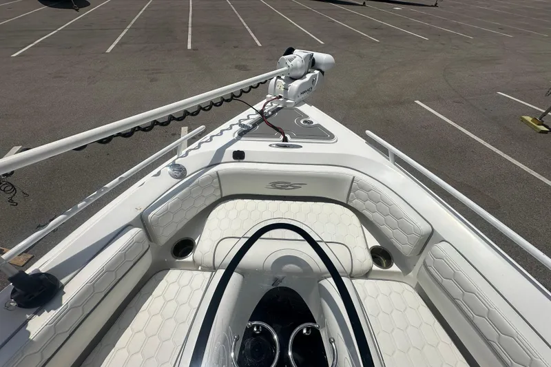 Slide: The Image of 2022 Glasstream 280 Pro-XS boat interior with white seating and fishing equipment. - 9
