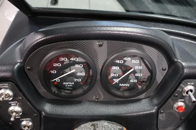 Slide: The Image of Dashboard of 2027 Crestliner 1650 Kodiak WT with RPM and speed gauges. - 26
