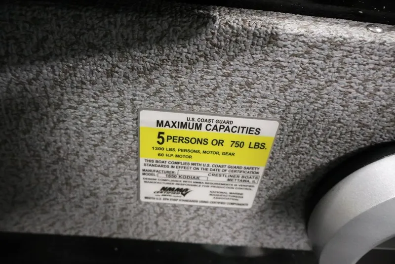 Slide: The Image of 2027 Crestliner 1650 Kodiak WT capacity label, 5 persons or 750 lbs limit. - 41