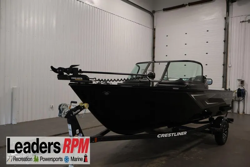 The Image of 2027 Crestliner 1650 Kodiak WT boat in showroom, featuring Minn Kota trolling motor. - 13
