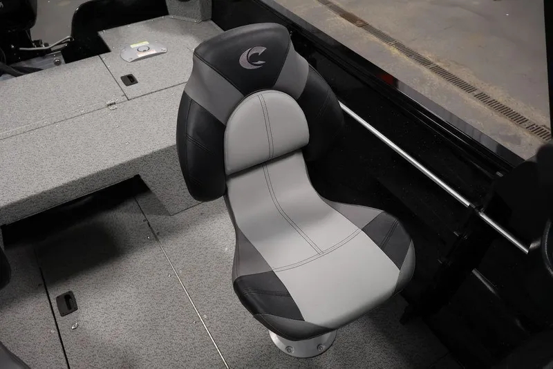 Slide: The Image of 2027 Crestliner 1650 Kodiak WT boat seat, featuring sleek black and gray design. - 42