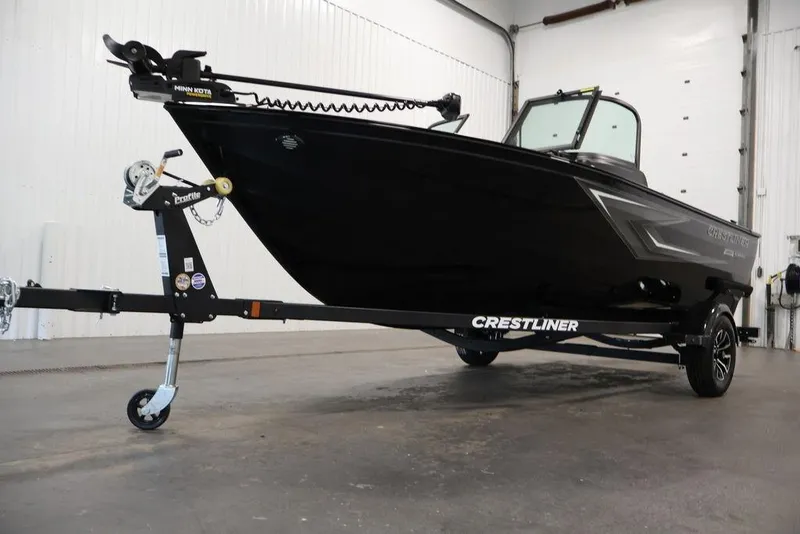 Slide: The Image of 2027 Crestliner 1650 Kodiak WT boat on trailer in indoor setting. - 61