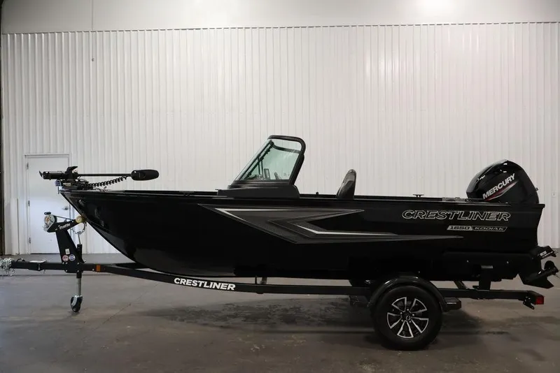 Slide: The Image of 2027 Crestliner 1650 Kodiak WT fishing boat with Mercury engine in showroom. - 36