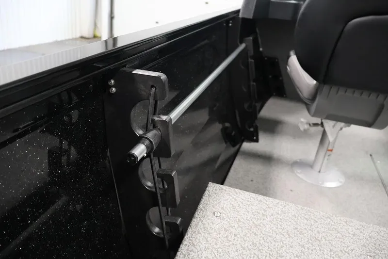 Slide: The Image of Interior view of 2027 Crestliner 1650 Kodiak WT boat, featuring seating and rod holder. - 53