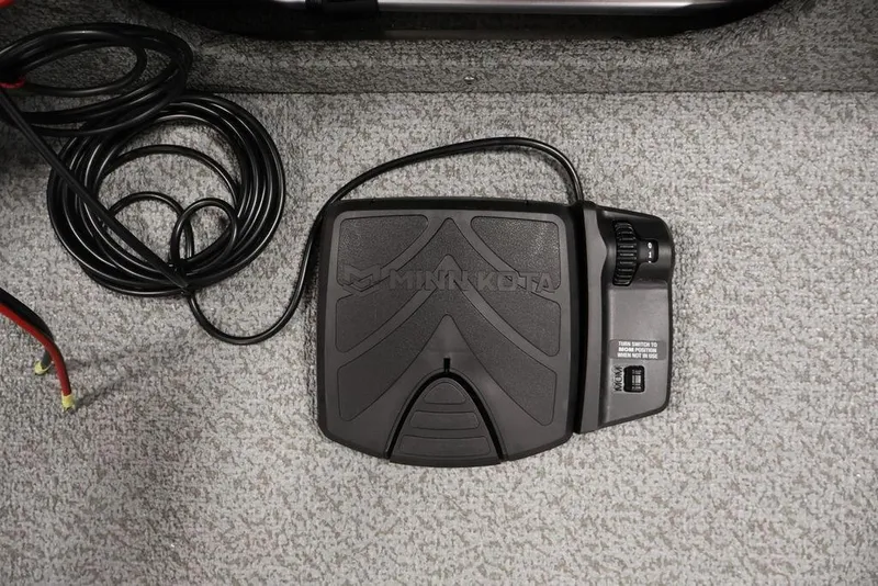 Slide: The Image of Foot pedal control on Crestliner 1650 Kodiak WT 2027 boat, featuring Minn Kota branding. - 21