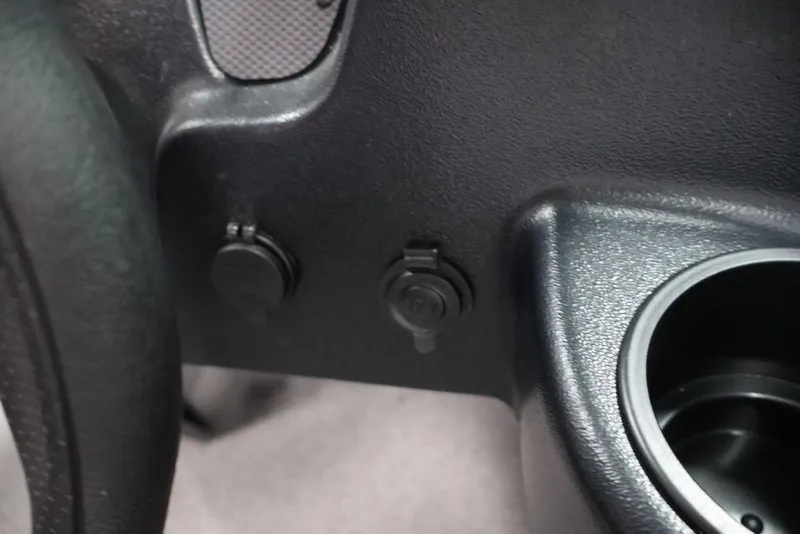 Slide: The Image of Dashboard of 2027 Crestliner 1650 Kodiak WT with cup holder and power outlets. - 40