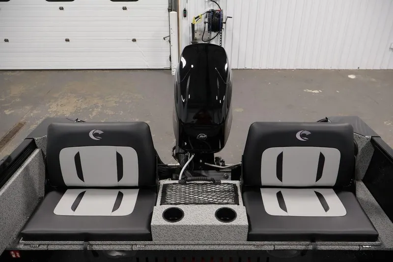Slide: The Image of 2027 Crestliner 1650 Kodiak WT boat interior with dual seats and motor. - 52